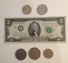 2 Dollar Note 1 Dollar Münze 1 Pfund Münze u.v.a