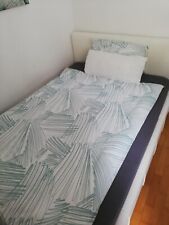 Bettgestell 140 x 200 weißes Kunstleder 