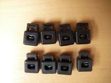 8 Kordelstopper eckig schwarz