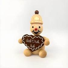 Wagner Schneemann Junior sitzend mit Lebkuchenherz, Nr 111, 7cm, echt Erzgebirge
