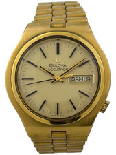 Goldene Herrenarmbanduhr Bulova Accutron Day & Date Quartz Kal. 2182, defekt