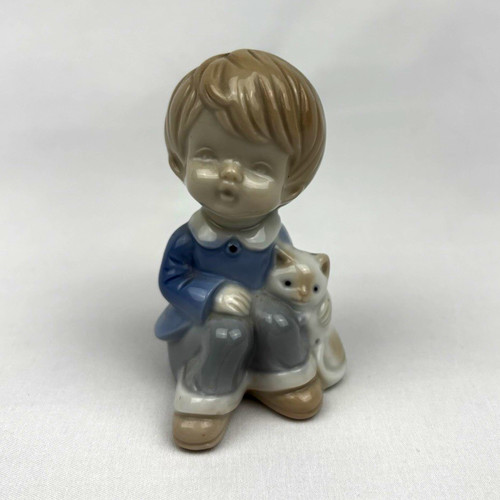 Porzellanfigur junge mit - junge,