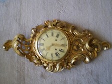 Große Wanduhr in Holz mit Vergoldung Höhe65cm Breite35cm-Tiefe11cm