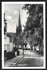 Ansichtskarte Sonderborg, Straßenansicht mit Kirche 