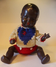 Alte farbige Massepuppe