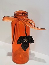 Vase orange mit Blatt Herbst
