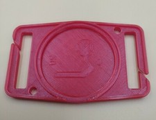 Objektivdeckelhalter zur Gurtbefestigung ,,#