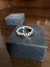 Niessing Spannring mit einem Padparadsha, Damenring modern