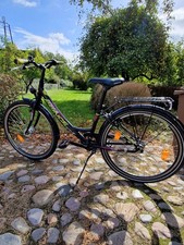 Gut erhaltenes Prince Breeze 26 er City- Jugendrad  Schwarz mit grünen Akzenten.