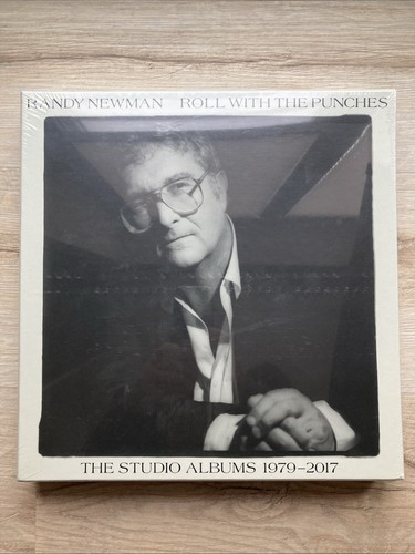 Randy newman roll with the - newman,