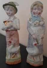 Porzellanfiguren Junge und Mädchen,mehrfarbig,teilweise glänzend (4590)