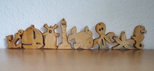 8 maritime Holzfiguren für den Friesenbaum