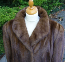 SAGA MINK, weiter Arm