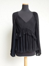 Schwarze Punkte Plissee Falten