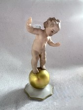 Hutschenreuther Porzellanfigur Putto – Engel auf Goldkugel