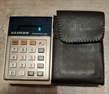 Vintage Lloyd´s Automatic 340 Mini Calculator Taschenrechner neuwertig um 1975