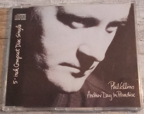 Phil collins another day in - -,