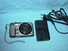 CASIO EXILIM EX - FH 100