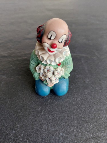 Gilde clown mit blumenstrauß - clown,