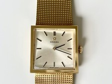 OMEGA  750 / 18 KARAT GOLD  71