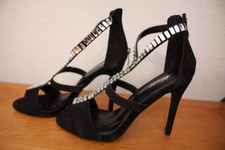 Schwarze High Heels für