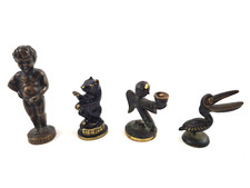 Konvolut Messing-Bronze Figuren Gluttöter Männekenpiss Bär Engel und Pelikan 50s