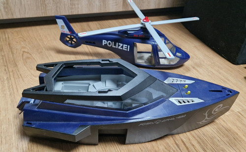 Polizeihubschrauber und boot - polizeihubschrauber,