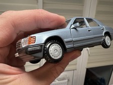 Modellauto Cursor 1084 Mercedes Benz 200-300E/200D-300D hellblau met. 1/35 W 124