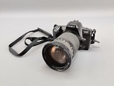 Spiegelreflex Kamera Minolta Dynax 303si mit Tokina 28-210 mm F 3.5-5.6