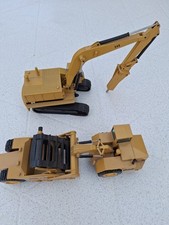  Caterpillar Bagger 245  mit Aufbruchhammer und Cat Schürfzug Selbstlader