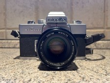 Minolta SRT 303b mit Objektiv f = 50 mm und Wechselobjektiv f = 200 mmmm