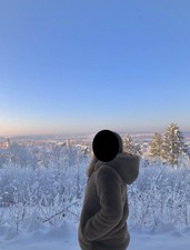 Kunstfelljacke mit Kapuze