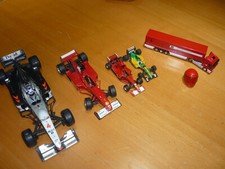 4 Verschiedene Rennwagen 1LKW 1Helm