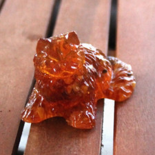 Bernstein Figur Katze liegend