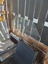 Glasscheibe unter Kaminofen