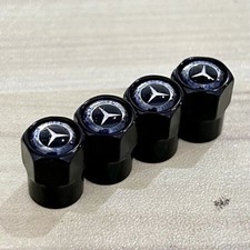 4X Logo Ventilkappen Schwarz