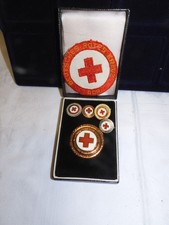 5 Abzeichen + 1 Aufnäher: DDR, Deutsches Rotes Kreuz (DRK)