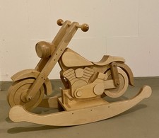 Schaukelmotorrad aus