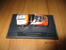 Smart TNT Hennes Express mit Anhänger Busch 1:87 1.FC Köln