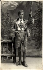 Foto Ak Junger Mann in Tracht
