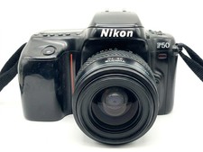 Nikon F50 + Tokina 35-70mm