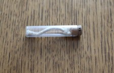 Dachbodenfund: unbenutzter Docht in Glasröhrchen mit Korkverschluss