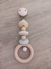Kinderwagenkette Holz Spielkette Glocke Rosa