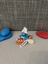 1x Indianer im Kanu mit Fähnchen noch Schlümpfe smurfs (E025)