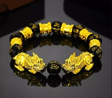 Armband "Pi Xiu" Resin Perlen, schwarz/gold, flexibel