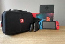 Nintendo Switch Neon‑Rot/Neon‑Blau – sehr guter Zustand – Komplettpaket