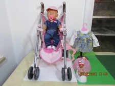 Baby Born Puppe mit Buggy und viel Zubehör