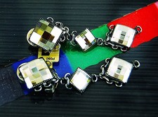 Konplott Clips silber Swarovski  3 goldelb gangierende Quadrate neu