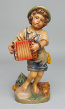 Figur Junge mit Zieharmonika