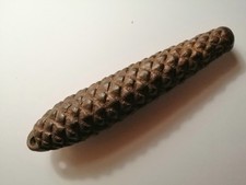 Ein altes Uhrengewicht